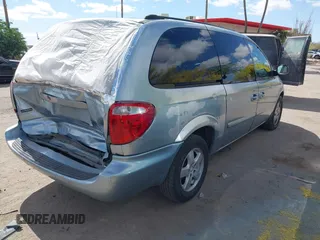 2005 Dodge Caravan SXT with VIN 2D4GP44L75R193138, listed as a IAAI auction lot 42073429 with 206,915 mi miles and . Bid and sale history available at DreamBid. Image 4.