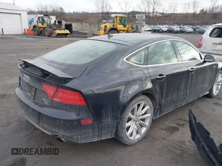 2014 Audi A7 3.0 Prestige with VIN WAU2GAFC5EN071911, listed as a IAAI auction lot 41453159 with 120,569 mi miles. Bid and sale history available at carsss.com. Image 4.