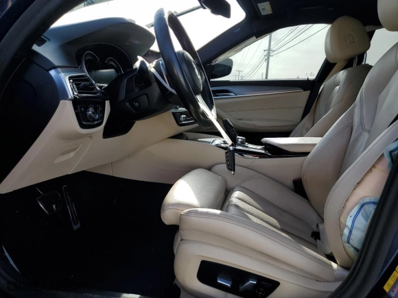 2019 BMW 5 Series 530e iPerformance with VIN WBAJA9C51KB389944, listed as a Copart auction lot 87080924 with 83,935 mi miles and Salvage Title. Bid and sale history available at carsss.com. Image 7.