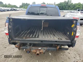 2015 Toyota Tacoma with VIN 3TMLU4EN6FM182144, listed as a Copart auction lot 64000365 with 185,361 mi miles and Clean title. Bid and sale history available at DreamBid. Image 6.
