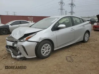 2021 Toyota Prius L Eco z VIN JTDKAMFU8M3150319, wystawiony jako Copart lot #52781465 z przebiegiem 51 834 mil mil oraz Szkoda całkowita • Salvage title. Historia ofert i sprzedaży dostępna na DreamBid. Obrazek 1.
