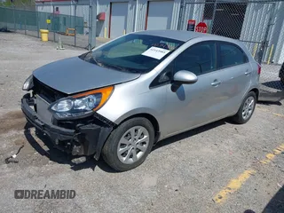 2013 Kia Rio LX with VIN KNADM5A33D6307061, listed as a IAAI auction lot 42143985 with 66,621 mi miles and . Bid and sale history available at DreamBid. Image 2.