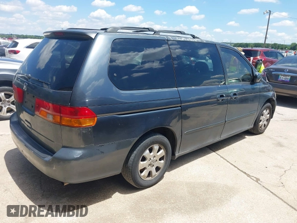 2004 Honda Odyssey EX-L with VIN 5FNRL18974B059223, listed as a IAAI auction lot 42249508 with 247,856 mi miles and . Bid and sale history available at DreamBid. Image 4.