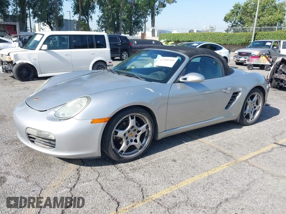 2007 Porsche Boxster z VIN WP0CA29837U710558, wystawiony jako IAAI lot #42506943 z przebiegiem 129 446 mil mil oraz . Historia ofert i sprzedaży dostępna na DreamBid. Obrazek 18.
