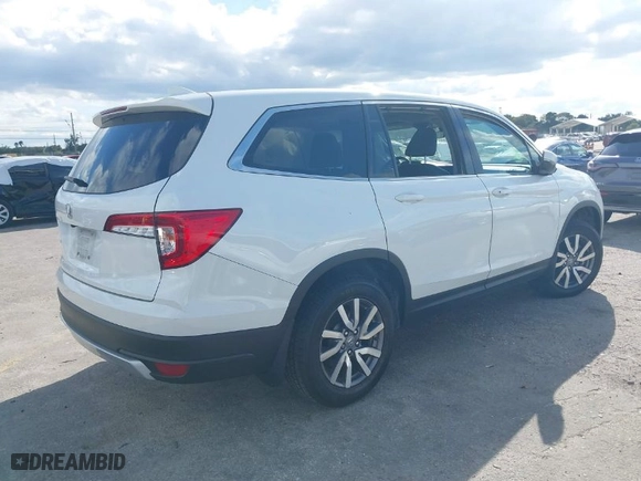 2021 Honda Pilot EX-L with VIN 5FNYF5H55MB039589, listed as a IAAI auction lot 41694567 with 58,685 mi miles. Bid and sale history available at carsss.com. Image 4.