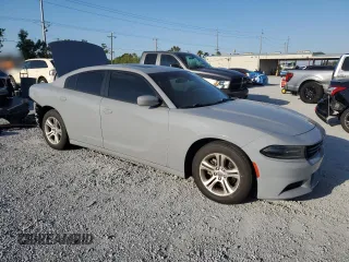 2021 Dodge Charger SXT with VIN 2C3CDXBG6MH518284, listed as a Copart auction lot 50682295 with 89,674 mi miles and Salvage Title. Bid and sale history available at carsss.com. Image 4.