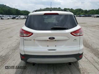 2013 Ford Escape SE with VIN 1FMCU9G9XDUA92061, listed as a Copart auction lot 63074655 with 150,848 mi miles and Salvage title. Bid and sale history available at DreamBid. Image 6.