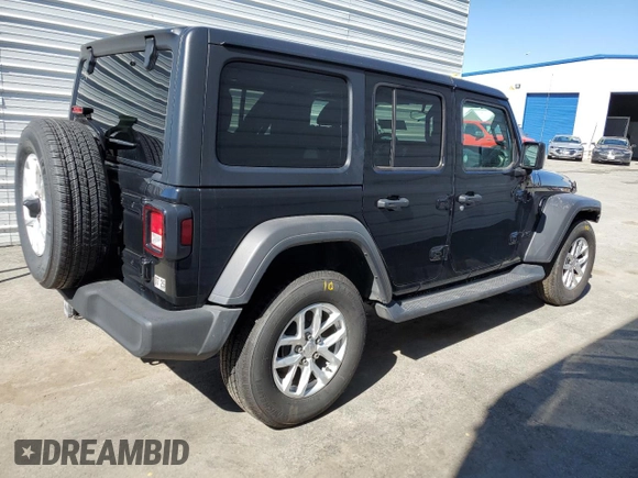 2023 Jeep Wrangler Sport with VIN 1C4HJXDNXPW701795, listed as a Copart auction lot 50451444 with 7,274 mi miles and Salvage Title. Bid and sale history available at DreamBid. Image 3.