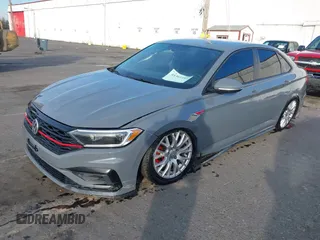 2020 Volkswagen Jetta GLI S with VIN 3VW6T7BU8LM099899, listed as a IAAI auction lot 41361494 with 92,219 mi miles and . Bid and sale history available at DreamBid. Image 2.