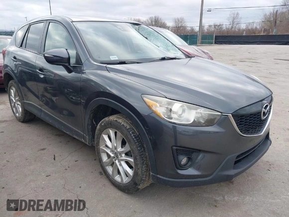 2015 Mazda CX-5 Grand Touring with VIN JM3KE4DY0F0479229, listed as a IAAI auction lot 41838381 with 139,843 mi miles. Bid and sale history available at carsss.com. Image 1.