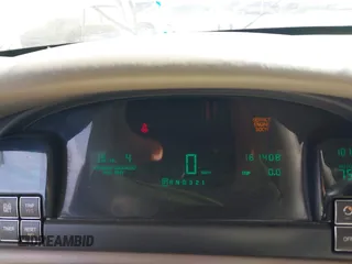 1999 Cadillac DeVille z VIN 1G6KD54YXXU794294, wystawiony jako IAAI lot #42141931 z przebiegiem 161 408 mil mil oraz . Historia ofert i sprzedaży dostępna na DreamBid. Obrazek 7.