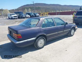 1987 Honda Accord with VIN 1HGCA5633HA056403, listed as a IAAI auction lot 42064156 with 157,683 mi miles and . Bid and sale history available at DreamBid. Image 4.