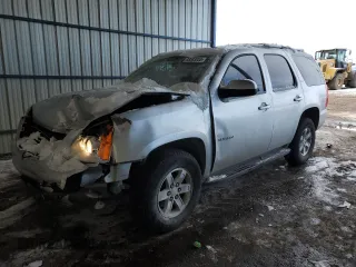2014 GMC Yukon SLT with VIN 1GKS1CE05ER205241, listed as a Copart auction lot 88583055 with 130,691 mi miles and Salvage Title. Bid and sale history available at carsss.com. Image 1.