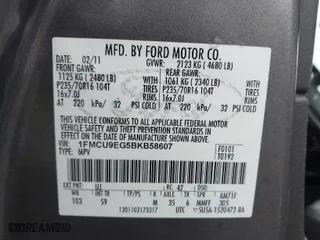 2011 Ford Escape Limited with VIN 1FMCU9EG5BKB58607, listed as a IAAI auction lot 41828618 with 173,708 mi miles. Bid and sale history available at carsss.com. Image 9.