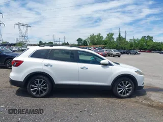 2014 Mazda CX-9 Grand Touring z VIN JM3TB3DV0E0436649, wystawiony jako IAAI lot #42319638 z przebiegiem 128 421 mil mil oraz . Historia ofert i sprzedaży dostępna na DreamBid. Obrazek 13.
