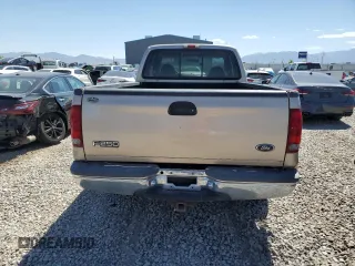1999 Ford F-250 XL z VIN 1FTNX20S3XEA68692, wystawiony jako Copart lot #64331775 z przebiegiem 106 939 mil mil oraz Czysty tytuł • Clean title. Historia ofert i sprzedaży dostępna na DreamBid. Obrazek 6.