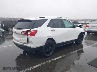 2021 Chevrolet Equinox Premier with VIN 2GNAXNEV7M6112087, listed as a IAAI auction lot 41102702 with 32,995 mi miles. Bid and sale history available at carsss.com. Image 4.