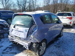 2015 Chevrolet Spark LS with VIN KL8CB6S91FC713818, listed as a IAAI auction lot 41374753 with 125,621 mi miles. Bid and sale history available at carsss.com. Image 4.