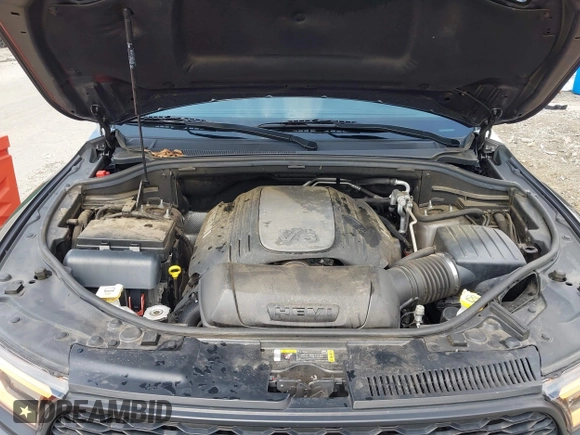 2021 Dodge Durango R/T with VIN 1C4SDJCT6MC762357, listed as a IAAI auction lot 42273951 with 59,581 mi miles and . Bid and sale history available at DreamBid. Image 10.