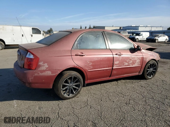 2005 Kia Spectra LX with VIN KNAFE122855108907, listed as a Copart auction lot 77502354 with Not Provided miles and Salvage Title. Bid and sale history available at carsss.com. Image 3.