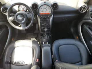 2014 MINI Countryman with VIN WMWZB3C54EWR39731, listed as a Copart auction lot 63635215 with 85,751 mi miles and Salvage title. Bid and sale history available at DreamBid. Image 8.