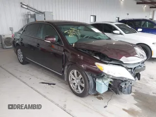 2012 Toyota Avalon with VIN 4T1BK3DB7CU463729, listed as a IAAI auction lot 41301213 with 59,923 mi miles. Bid and sale history available at carsss.com. Image 1.
