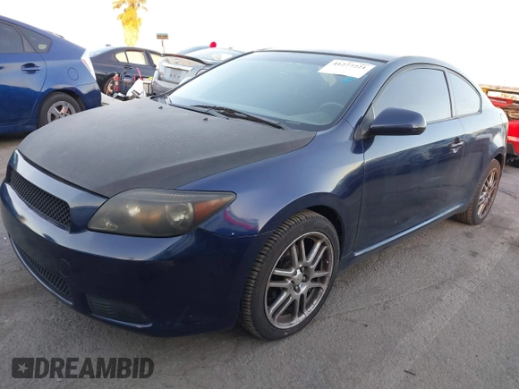 2006 Scion tC with VIN JTKDE167560098683, listed as a IAAI auction lot 41277221 with 179,476 mi miles. Bid and sale history available at carsss.com. Image 2.