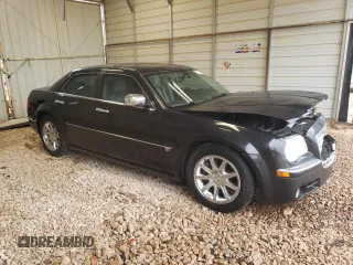 2006 Chrysler 300 C with VIN 2C3KA63H66H400714, listed as a Copart auction lot 71831914 with 288,577 mi miles and Salvage Title. Bid and sale history available at carsss.com. Image 4.