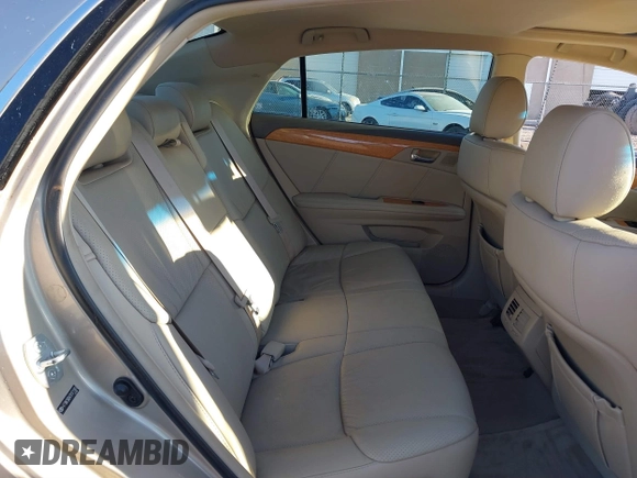 2007 Toyota Avalon XL with VIN 4T1BK36B47U171183, listed as a IAAI auction lot 41840097 with 115,143 mi miles. Bid and sale history available at carsss.com. Image 8.