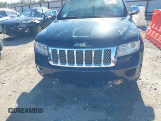 2013 Jeep Grand Cherokee Overland with VIN 1C4RJFCT1DC654653, listed as a IAAI auction lot 41826619 with 124,283 mi miles. Bid and sale history available at carsss.com. Image 6.