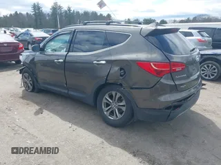 2014 Hyundai Santa Fe with VIN 5XYZUDLB6EG213889, listed as a IAAI auction lot 42036202 with 188,247 mi miles and . Bid and sale history available at DreamBid. Image 3.