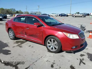 2013 Buick LaCrosse Premium 1 with VIN 1G4GF5E31DF325784, listed as a Copart auction lot 51942655 with 147,743 mi miles and Salvage title. Bid and sale history available at DreamBid. Image 4.