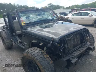 2008 Jeep Wrangler Unlimited Sahara with VIN 1J4GA59138L501621, listed as a IAAI auction lot 42245134 with 241,361 mi miles and . Bid and sale history available at DreamBid. Image 1.