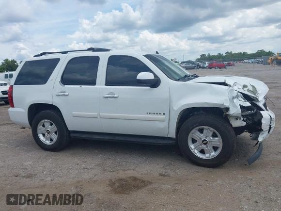 2007 Chevrolet Tahoe LTZ with VIN 1GNFC13J47J336516, listed as a IAAI auction lot 42545424 with 211,669 mi miles and . Bid and sale history available at DreamBid. Image 13.