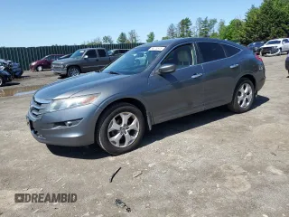 2012 Honda Crosstour EX-L z VIN 5J6TF2H53CL009635, wystawiony jako Copart lot #56073575 z przebiegiem 193 434 mil mil oraz Szkody całkowita. Historia ofert i sprzedaży dostępna na DreamBid. Obrazek 1.