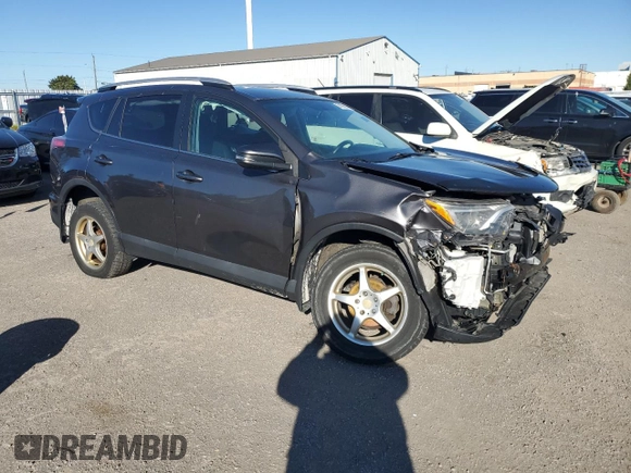 2016 Toyota RAV4 LE with VIN 2T3ZFREV3GW269727, listed as a Copart auction lot 74796814 with 235,242 mi miles and Salvage Title. Bid and sale history available at DreamBid. Image 4.