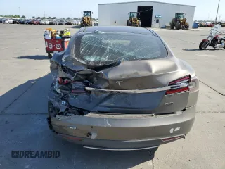 2016 Tesla Model S 90D with VIN 5YJSA1E2XGF133933, listed as a Copart auction lot 60736445 with 203,063 mi miles and Salvage title. Bid and sale history available at DreamBid. Image 6.