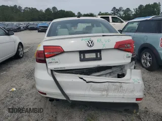 2015 Volkswagen Jetta SE с VIN 3VWD17AJ4FM328801, выставлен на аукционе Copart как лот 52684145 с пробегом 140 860 миль миль и Списание • Salvage title. История ставок и продаж доступна на DreamBid. Изображение 6.