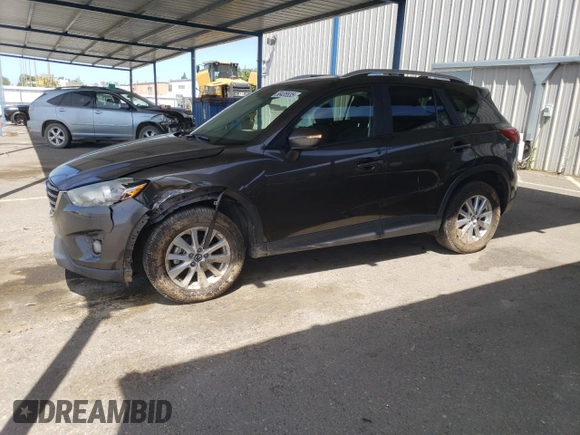 2016 Mazda CX-5 Touring z VIN JM3KE2CY4G0805072, wystawiony jako Copart lot #58435535 z przebiegiem 146 323 mil mil oraz Szkoda całkowita • Salvage title. Historia ofert i sprzedaży dostępna na DreamBid. Obrazek 1.