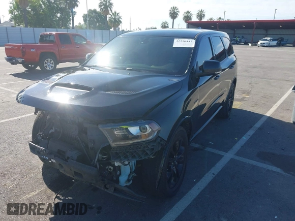 2020 Dodge Durango R/T with VIN 1C4SDHCT7LC285798, listed as a IAAI auction lot 42316447 with 86,344 mi miles and . Bid and sale history available at DreamBid. Image 18.