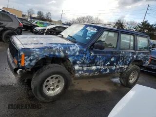 2001 Jeep Cherokee Sport z VIN 1J4FF48SX1L542657, wystawiony jako Copart lot #46953085 z przebiegiem 214 796 mil mil oraz Szkoda całkowita • Salvage title. Historia ofert i sprzedaży dostępna na DreamBid. Obrazek 1.