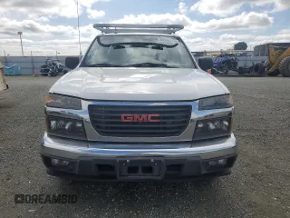 2012 GMC Canyon z VIN 1GTE5MFE6C8169267, wystawiony jako Copart lot #50096415 z przebiegiem 192 546 mil mil oraz Czysty tytuł • Clean title. Historia ofert i sprzedaży dostępna na DreamBid. Obrazek 5.