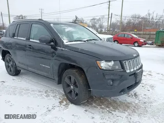 2016 Jeep Compass High Altitude Edition with VIN 1C4NJDEB8GD758174, listed as a IAAI auction lot 41235089 with 144,841 mi miles. Bid and sale history available at carsss.com. Image 1.
