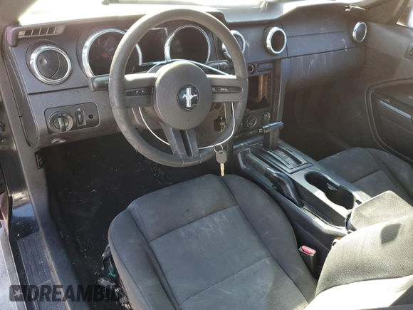 2007 Ford Mustang Deluxe with VIN 1ZVFT80N975339183, listed as a Copart auction lot 87650895 with 165,074 mi miles and Salvage Title. Bid and sale history available at carsss.com. Image 8.