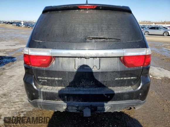 2013 Dodge Durango Citadel z VIN 1C4RDJEG1DC701187, wystawiony jako Copart lot #48036895 z przebiegiem Nie podano mil oraz Szkoda całkowita • Salvage title. Historia ofert i sprzedaży dostępna na DreamBid. Obrazek 6.