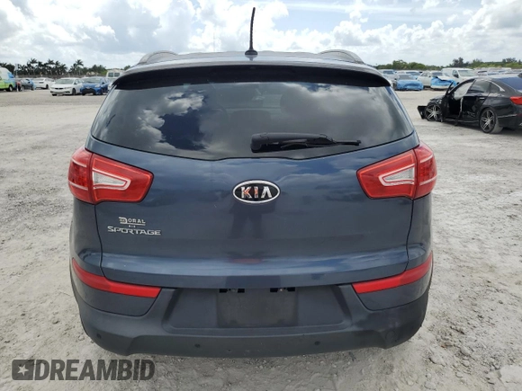 2012 Kia Sportage LX z VIN KNDPB3A29C7240993, wystawiony jako Copart lot #61408165 z przebiegiem 171 453 mil mil oraz Czysty tytuł • Clean title. Historia ofert i sprzedaży dostępna na DreamBid. Obrazek 6.