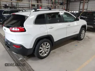 2014 Jeep Cherokee Limited with VIN 1C4PJMDS1EW235980, listed as a IAAI auction lot 41994044 with 128,292 mi miles and . Bid and sale history available at DreamBid. Image 4.
