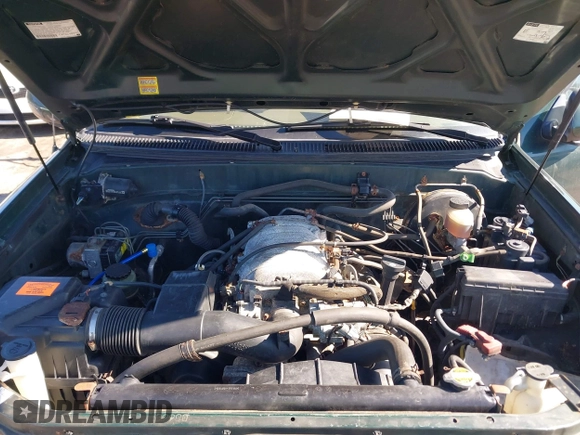 2000 Toyota Tundra Limited with VIN 5TBBT4815YS065867, listed as a IAAI auction lot 41995501 with 208,889 mi miles. Bid and sale history available at carsss.com. Image 10.