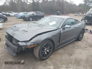 2021 Ford Mustang EcoBoost with VIN 1FA6P8TD8M5101305, listed as a IAAI auction lot 41475581 with 32,762 mi miles. Bid and sale history available at carsss.com. Image 2.