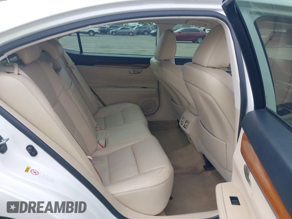 2014 Lexus ES 300h with VIN JTHBW1GG5E2064531, listed as a IAAI auction lot 42119900 with 210,354 mi miles and . Bid and sale history available at DreamBid. Image 8.
